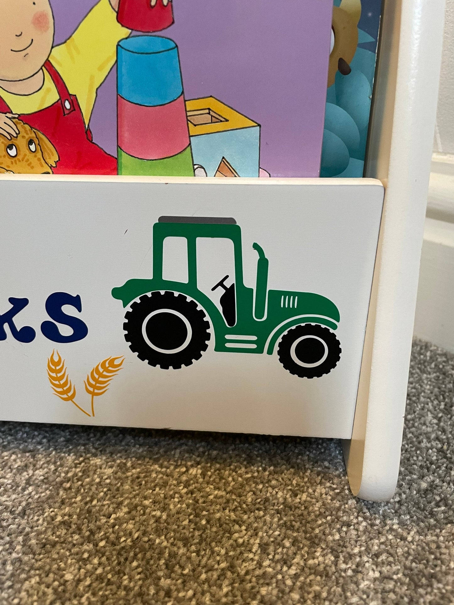 Personalised child’s portable bookcase.